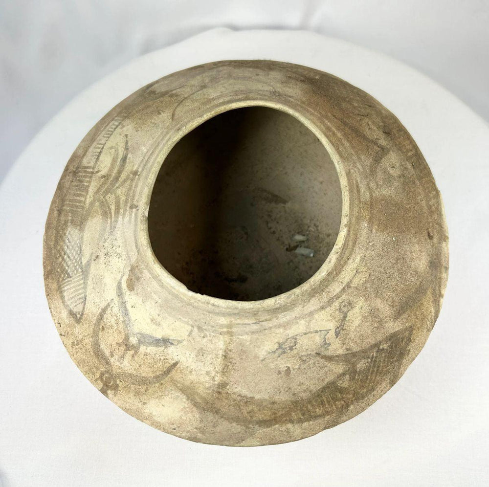 Top view of painted terracotta bowl from the Indus Valley civilization featuring ritual fish imagery