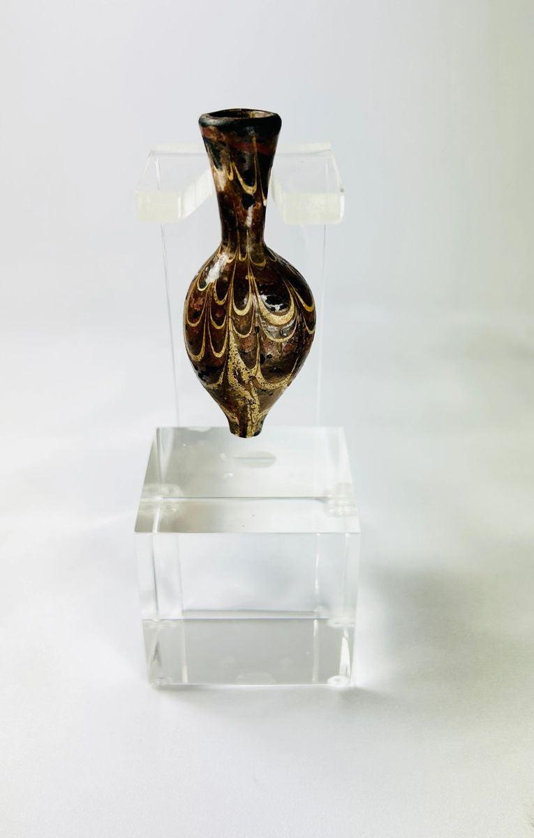 Late Roman to Byzantine teardrop-shaped glass vessel with slender neck