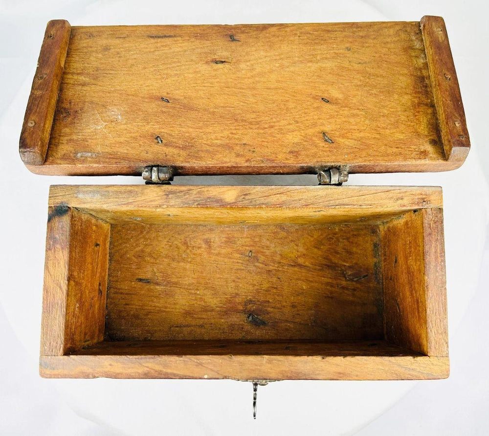 Early 19th century travel lockbox with hand-forged iron mounts, rich natural patina, and original interior.