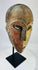 20th-century Dan mask from West Africa with ritual patina