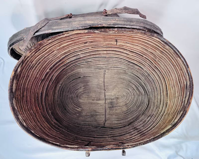 Interior basketry of antique Himalayan woven storage container