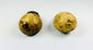 Back view of carved Tibetan bone beads, highlighting natural bone texture, patina, and rear suspension openings.