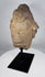 Stylized African stone face fragment with geometric features and headdress