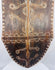 Reverse of the African wooden shield showing its substantial hand-carved carrying grip