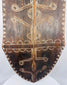 Reverse of the African wooden shield showing its substantial hand-carved carrying grip