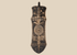 African carved wooden ceremonial shield with geometric decoration and central circular medallion