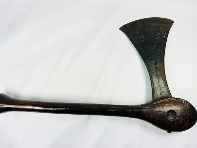 African Luba courtly prestige axe with decorated iron blade and richly patinated wooden handle