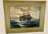 Signed oil on canvas board painting titled “Ships That Pass In The Night” by Alfred Gabali (1886–1963), circa 1958. Maritime scene depicting ships at sea with expressive brushwork and refined ocean and sky tones. Dedicated on verso to Carol Anne Kahne. Reflects Gabali’s German heritage, seafaring background, and Cape Cod art community influence.