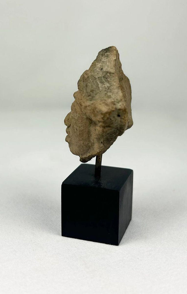 Detail of headband and facial modeling on an ancestor spirit effigy fragment