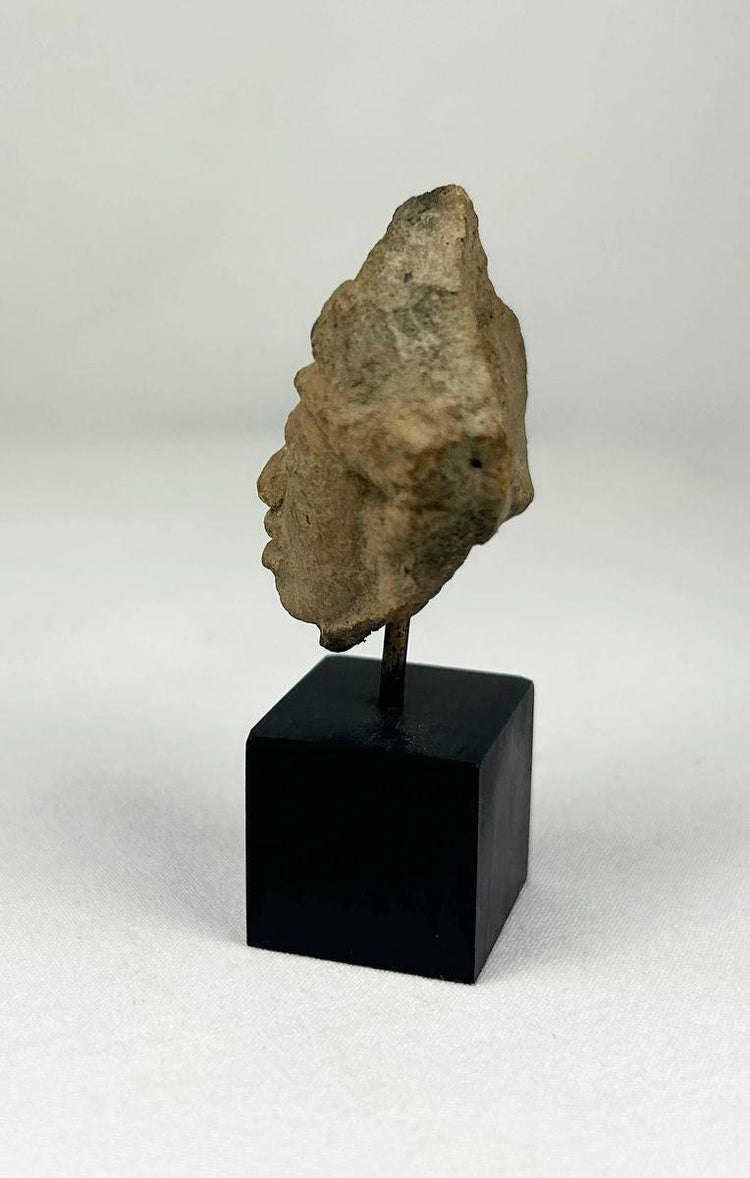 Detail of headband and facial modeling on an ancestor spirit effigy fragment