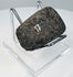 Pre-Columbian utilitarian stone axe from the Andean region mounted for display, dating to circa 200–800 CE.