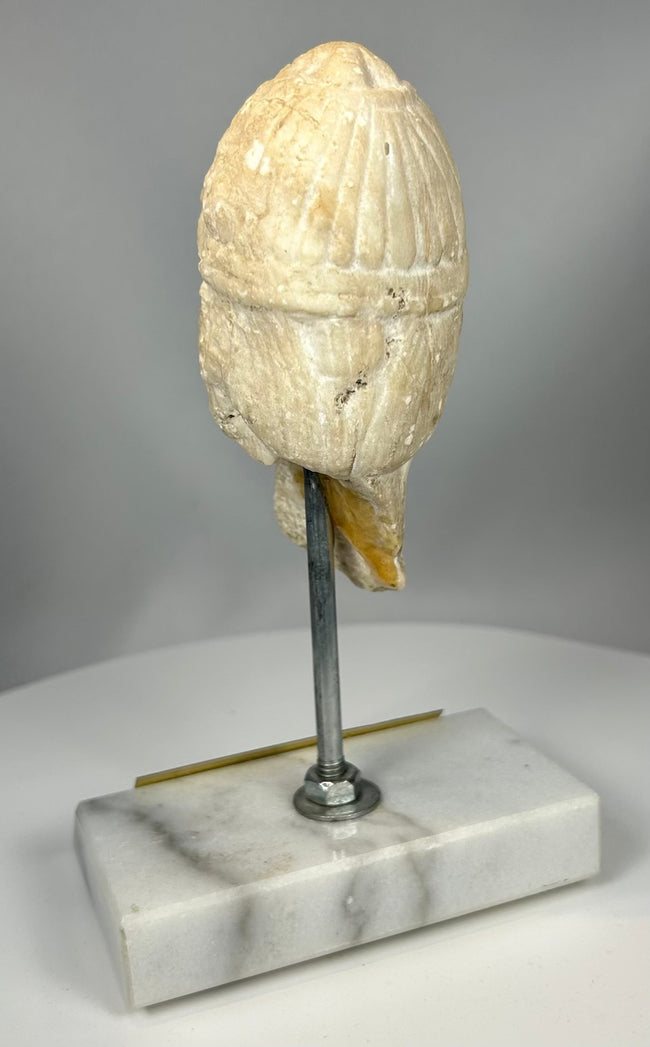 Ancient carved stone head from Assyria with burial patina