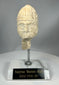 Ancient Near Eastern stone head with helmet and weathered surface
