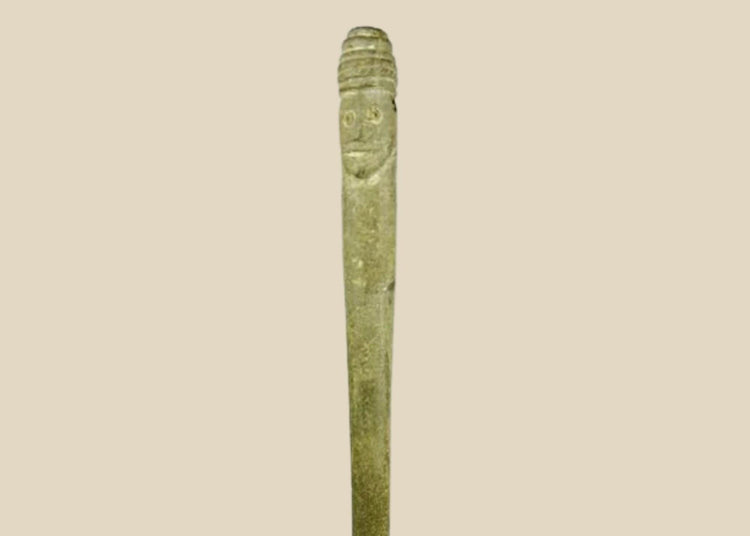 Ancient Bactrian dual-faced whetstone, 2nd millennium BCE, carved from chlorite or steatite with symmetrical features and natural patina.