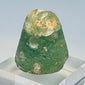 Close-up of ancient glass sealing face with confronted ibex motif