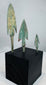 Ancient Iranian Plateau bronze weapon points with mineral encrustation and earthen deposits