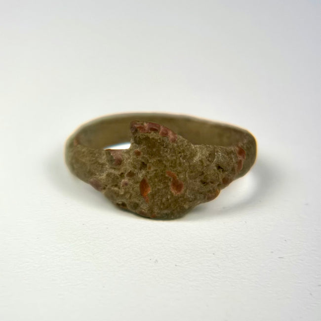 Antique Mediterranean or Middle Eastern bronze ring with preserved bezel and natural age-related patination