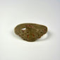 Ancient bronze ring featuring a robust circular band and simple geometric bezel form