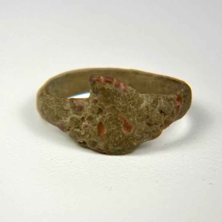 Mediterranean or Middle Eastern bronze finger ring with weathered bezel and centuries-old surface patina