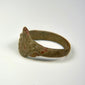 Early centuries CE bronze ring with minimalist design and age-related burial patination