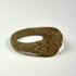 Ancient bronze ring from the 1st–5th century CE with balanced form and weathered surface finish