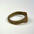 Historic bronze finger ring with substantial band, simple bezel, and archaeological patina