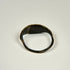 Ancient bronze finger ring featuring a symbolic bull associated with strength, fertility, and power