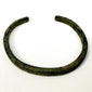 Archaeological bronze bracelet with open ends and naturally developed green surface patination