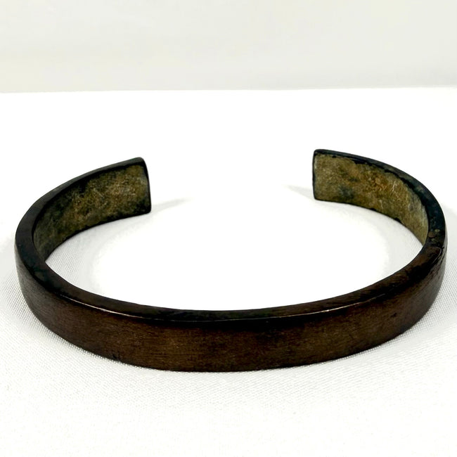 Ancient iron open cuff bracelet dating to the 1st to 3rd century AD with dark brown aged patina