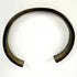Ancient iron bangle from the 1st to 3rd century AD showing aged oxidation and preserved open-ended form
