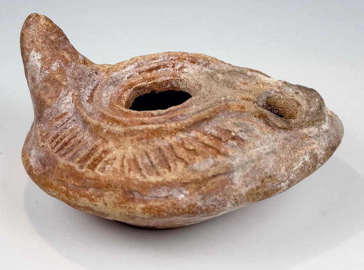 Late Roman ceramic lamp with raised nozzle channel and concentric base rings
