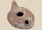 Late Roman to Early Byzantine terracotta oil lamp with radiating shoulder decoration
