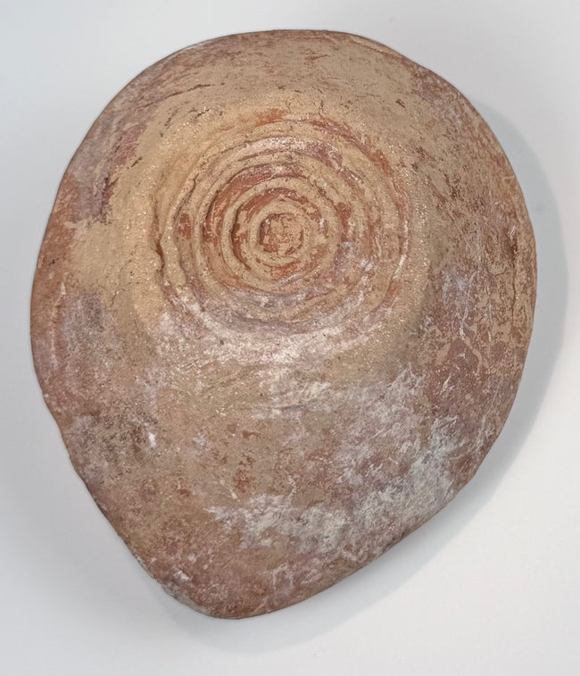 Early Byzantine oil lamp with mineral deposits and archaeological burial encrustation