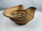 Archaeological terracotta saucer-shaped oil lamp from Carthage with heavily patinated bronze coins