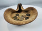 Ancient Carthage terracotta lighting vessel with associated bronze coins and archaeological wear