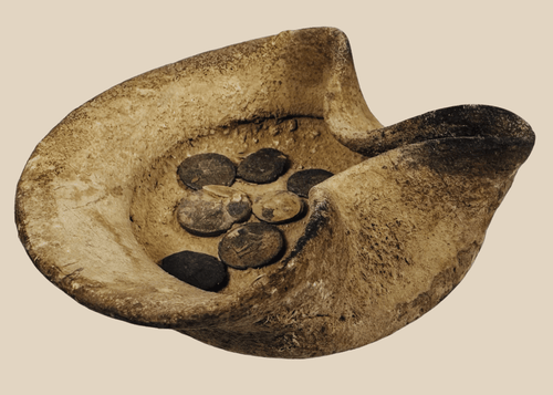 Ancient Carthaginian terracotta saucer-shaped oil lamp with associated bronze coins from Carthage, circa 5th Century BCE–1st Century AD