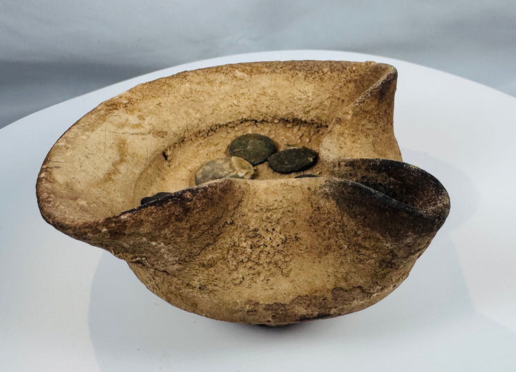 Ancient North African terracotta oil lamp with folded rim and associated bronze coins from Carthage