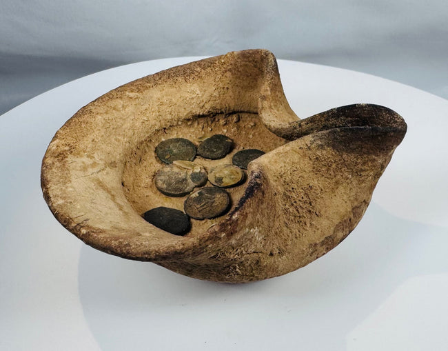 Rare Carthaginian saucer-shaped oil lamp with bronze coins recovered from archaeological excavations at Carthage