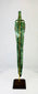 Bronze Age Persian blade from Caspian region, angled view revealing curved edge and ancient corrosion.