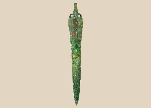 Ancient Caspian bronze blade with green patina and perforations