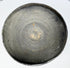 Interior of an ancient Chinese gray earthenware covered bowl showing visible concentric wheel-turning marks and lighter clay deposits.