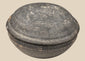 Ancient Chinese gray pottery covered bowl attributed to the Tang Dynasty, shown closed with shallow domed lid and aged earthenware surface.
