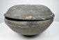 Ancient Tang Dynasty Chinese pottery covered bowl from an alternate angle, showing the lenticular profile and closely fitted two-part form.