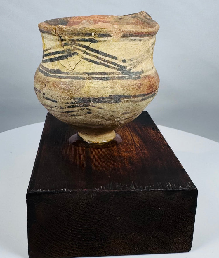 Ancient Majiayao-style painted pottery jar displaying geometric black designs