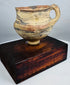 Hand-formed Chinese painted pottery vessel dating to the Neolithic period