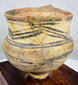 Rare painted pottery vessel from prehistoric China mounted for display
