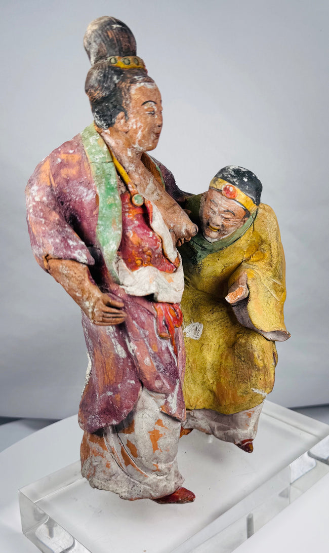 Chinese filial piety scene with deeply modeled figures, layered robes, and surviving pigments