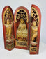 Antique Chinese folding Buddhist altar featuring central deity with attendant figures