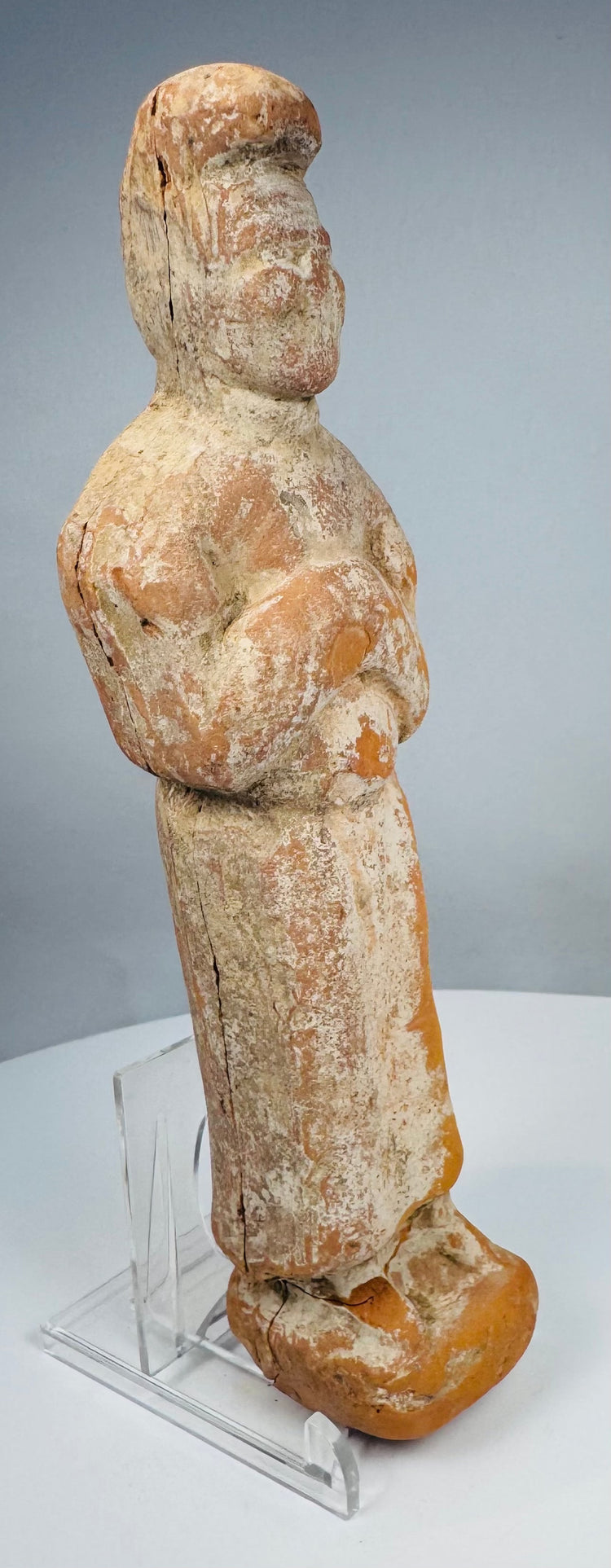 Front view of ancient Chinese terracotta court lady with formal standing posture