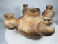Pre-Columbian ceramic vessel with buff, brown, and black coloration